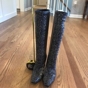 Faux snakeskin high heel boots